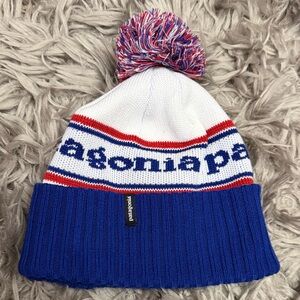 Patagonia Blue and White Striped Beanie with Pom-Pom